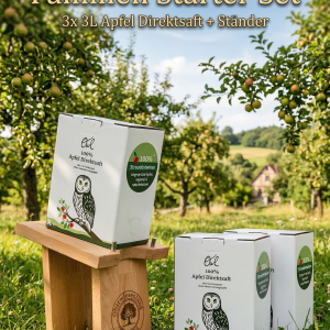 3x 3L Apfelsaft Bag-in-Box Kartons gestapelt mit einem hölzernen Zapfständer